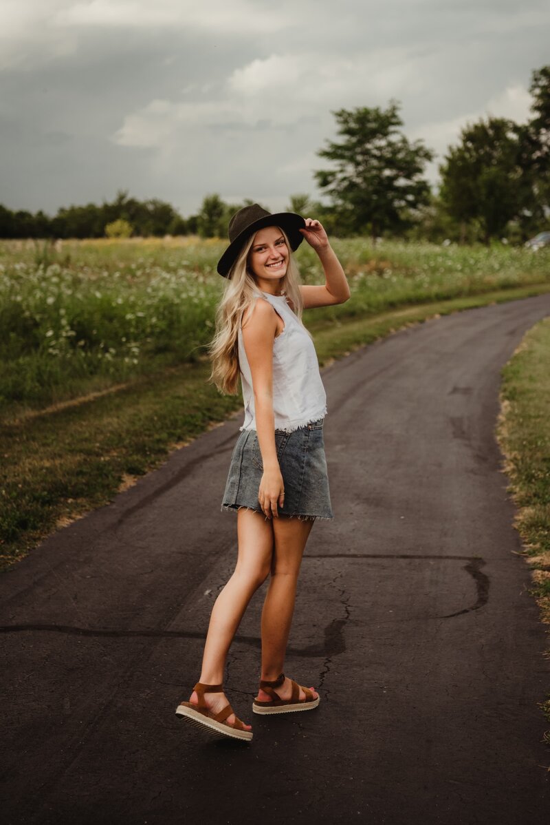 woman smiling in a field