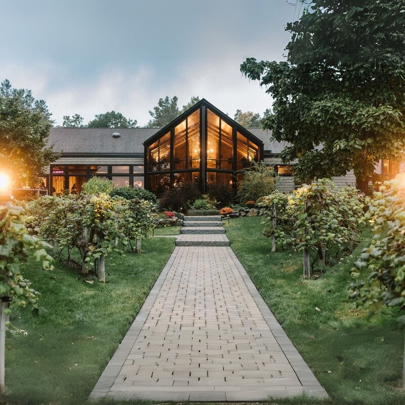 Gardens at Uncanoonuc Mountain - Couple Portrait with Outdoor Tent Venue as Backdrop