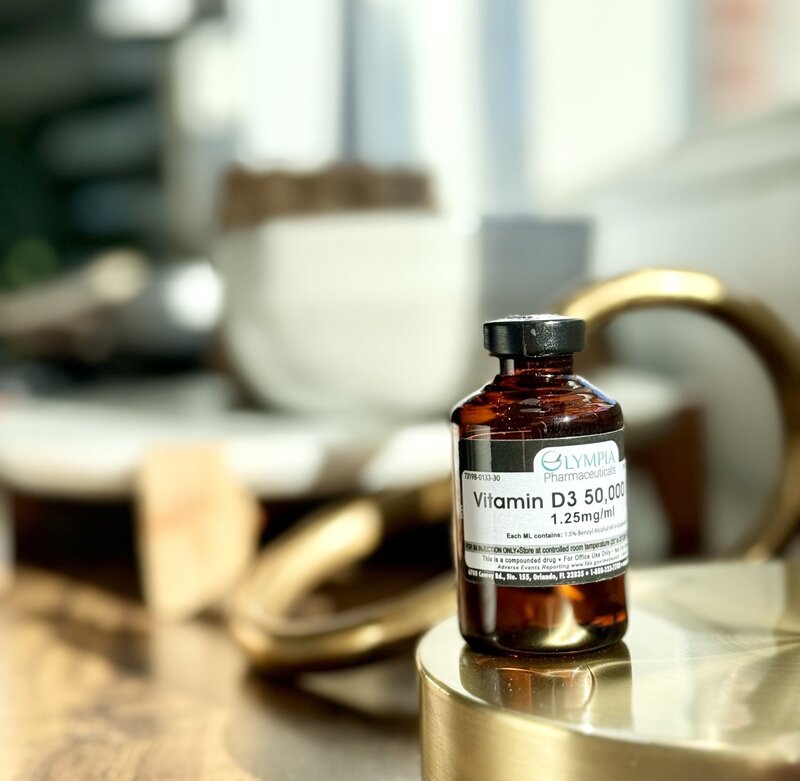 Amber vial sitting on a wood table