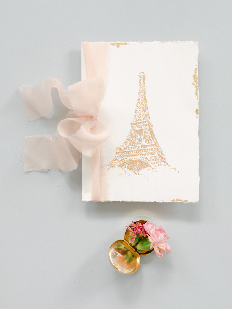 The Bride discovering her brunch of flowers in her Tour Eiffel Suite in Paris