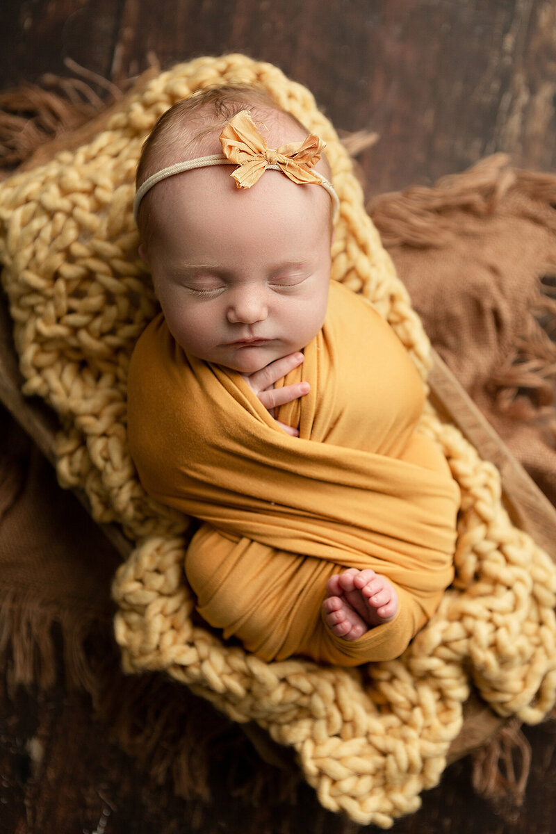 columbus-ohio-newborn-baby-girl-in-golden-yellow-swaddle-amanda-estep-photography