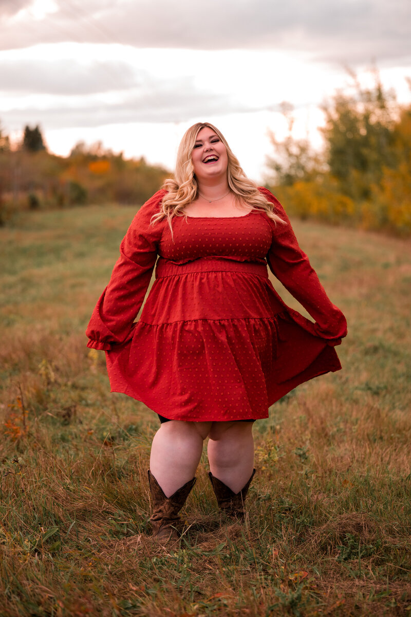 Edmonton wedding photographer in a field, loving life