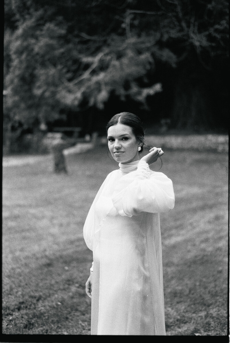 A bride in the gardens of Pazo de Treilán, Galicia,  on her wedding day, photographed on 35mm film