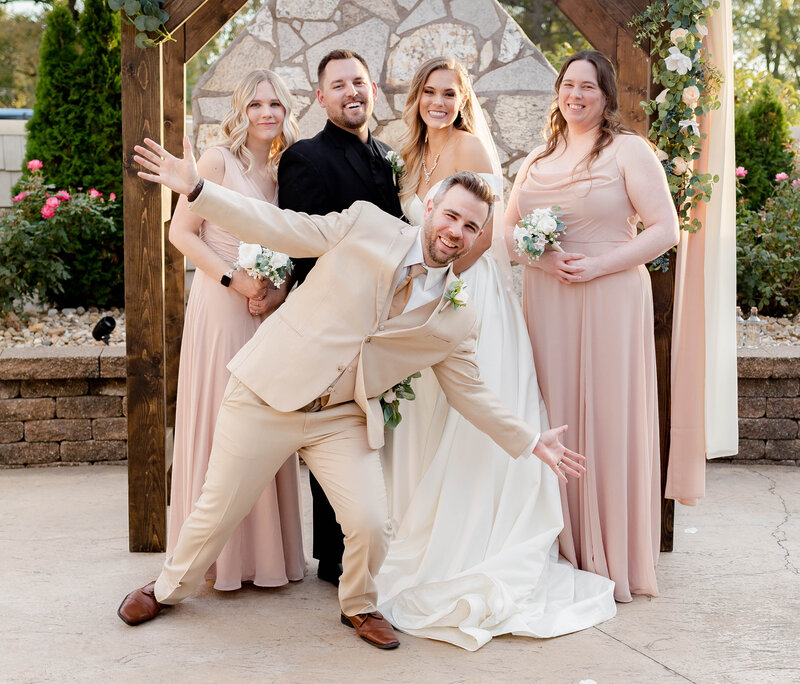 Joyful family fun captured by Style & Grace Photography at a wedding in Foristell, MO, showcasing the love and laughter shared among the newlyweds and their loved ones.