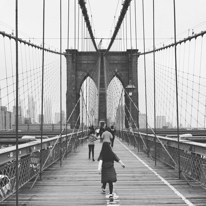 Brad on a bridge with his family