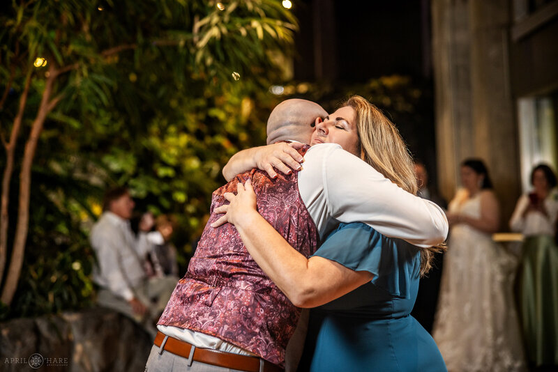 Mother son dance at Marnie's Pavilion wedding reception at Denver Botanic Gardens