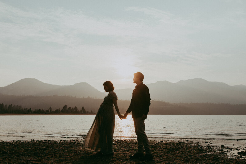 bride and groom smiling at each other