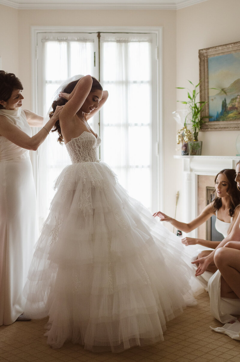 bride getting ready photo by suess moments wedding photography in New jersey