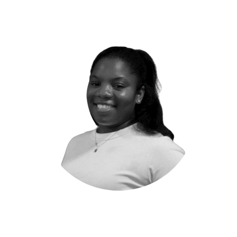 A young woman in a white t-shirt of Jamaican decent.