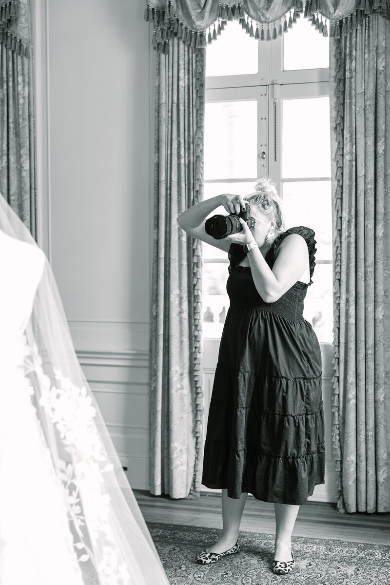 Wedding photographer dana cubbage photographs a bride's dress at lowndes grove in charleston sc