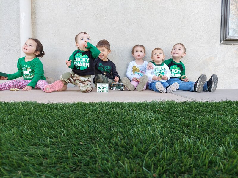 Group of Toddlers Outside Smiling Together CPC Albuquerque Daycare
