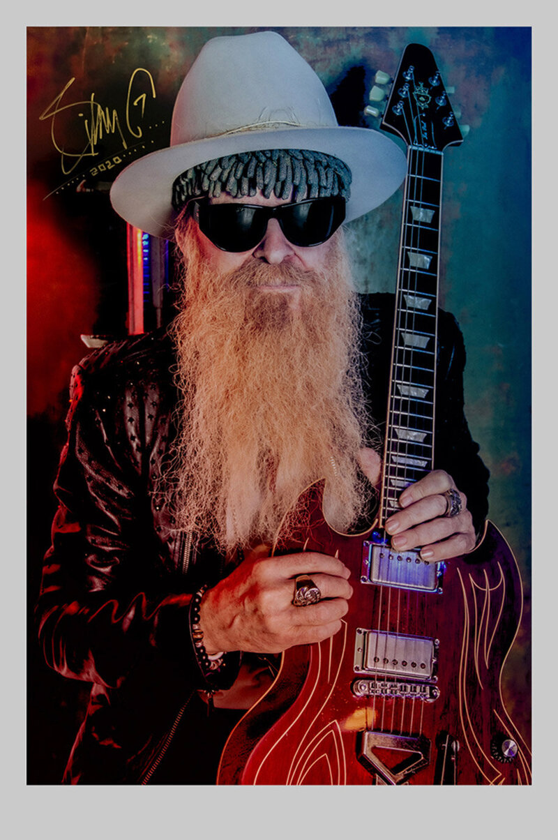 Billy F Gibbons Autographed Print The Art of Giving color portrait Billy holding his red guitar