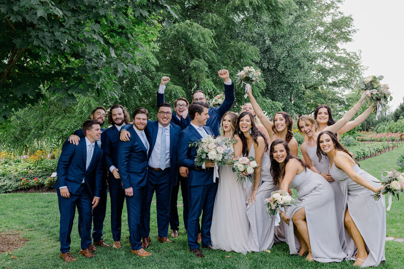 Grey Loft Studio - Bethany and Luc Barette - Wedding Photography Wedding Videography Ottawa - Ashley Graeme Side Door Restaurant Ottawa Wedding - Bridal Party Cheering On Wedding Couple