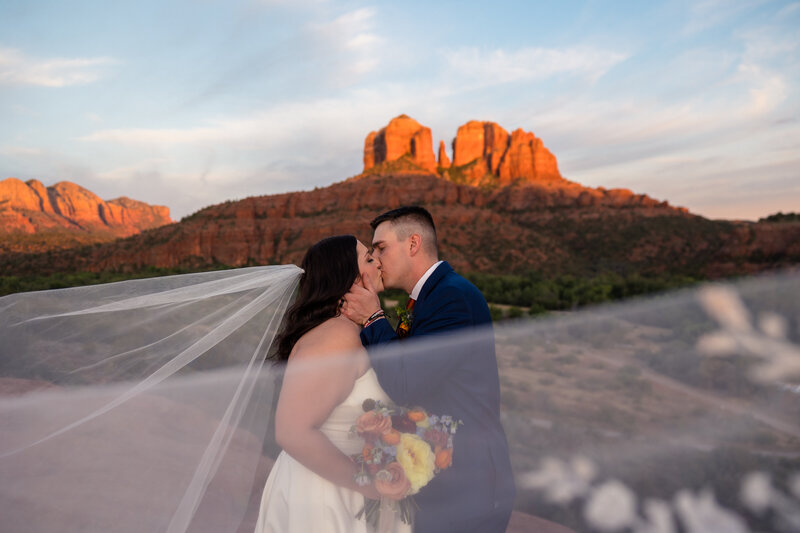 bride and groom eloping at cathedral rock