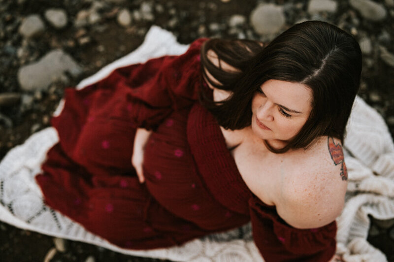expecting mother during photography session with Portland maternity photographer