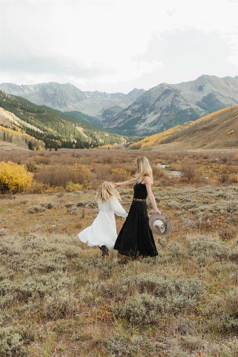 Editorial Aspen family portrait capturing candid joy with refined style, soft mountain light, and timeless Colorado elegance.