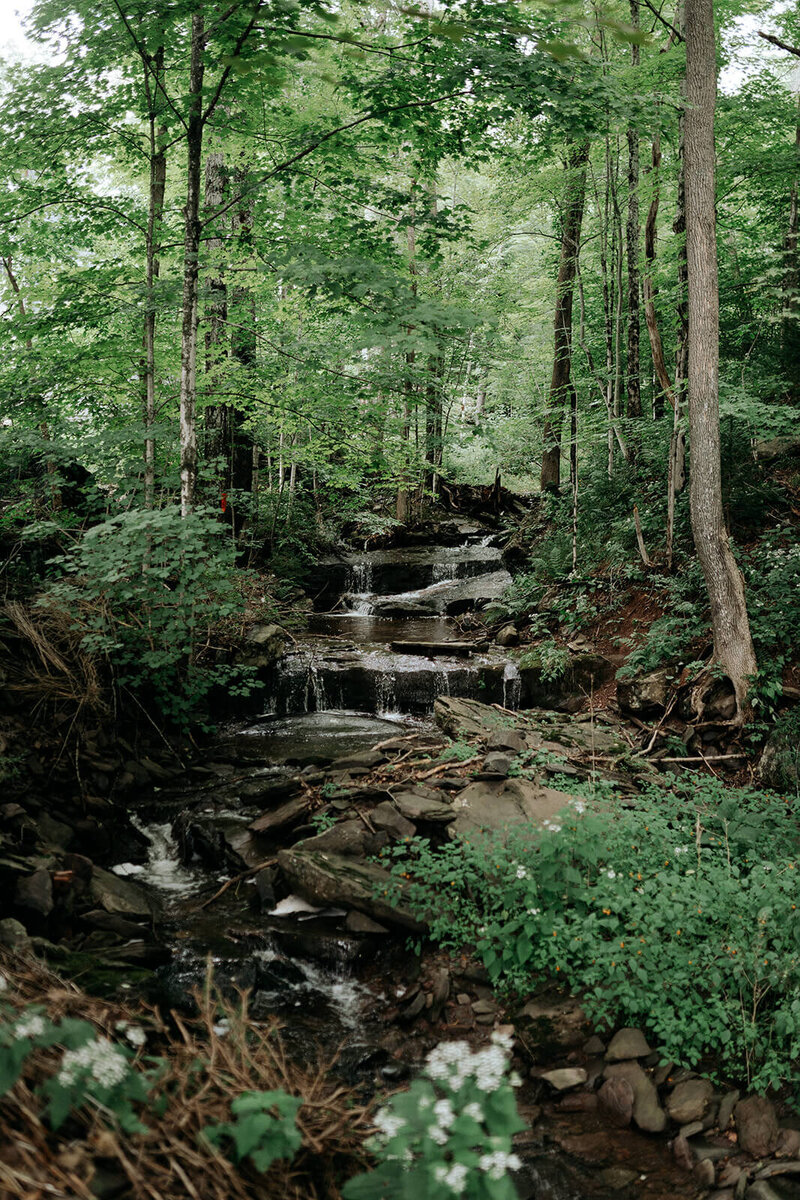 A waterfall at the Roxbury Barn and Estate wedding venue in the Catskills