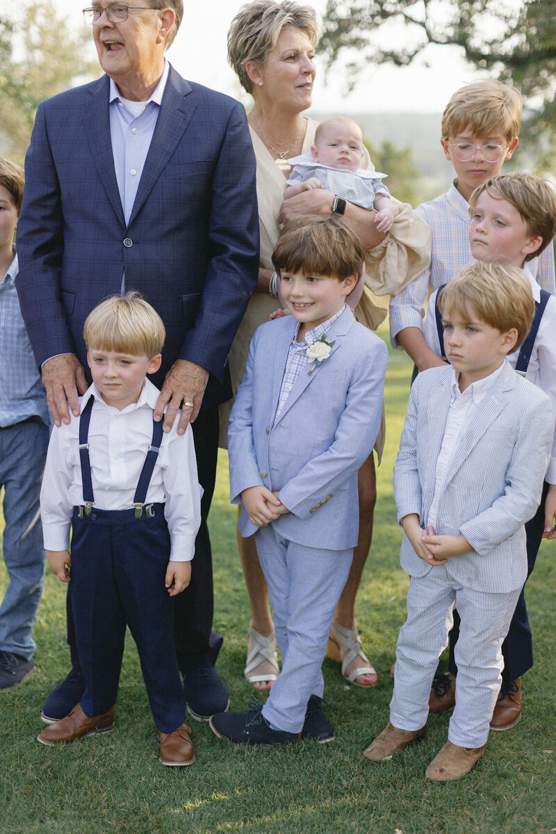 Family portraits at Canyonwood Ridge with Hill Country backdrop