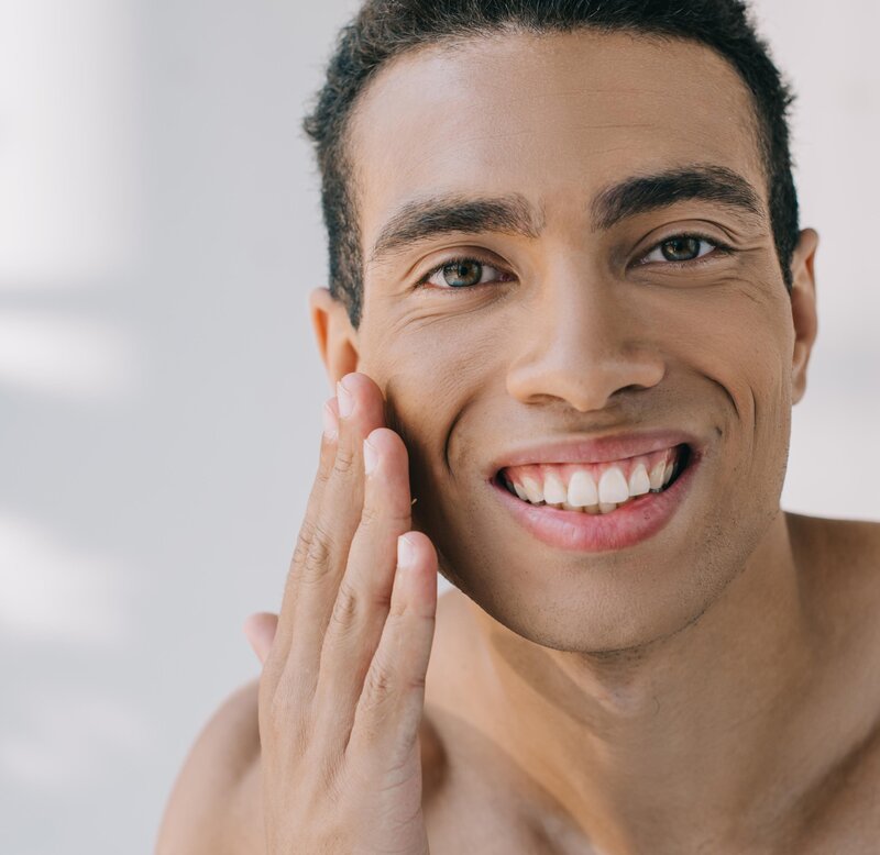 happy face of dark skin male