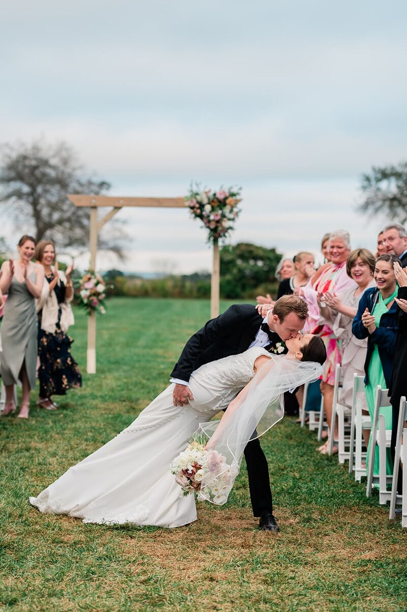 Bride and groom embracing each other