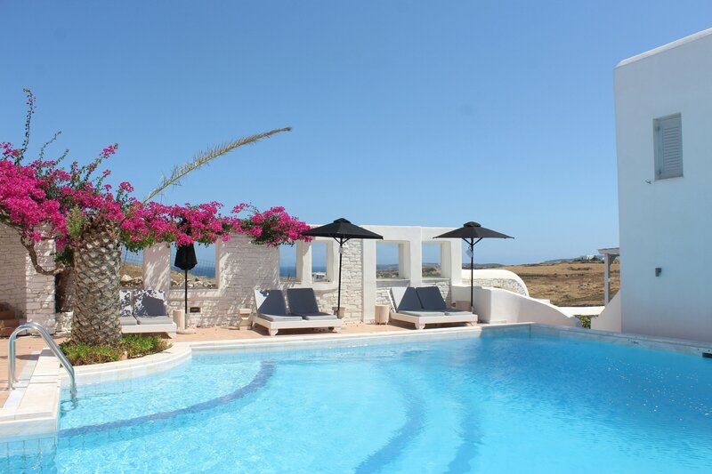 Luxury pool view in Greece at sunset