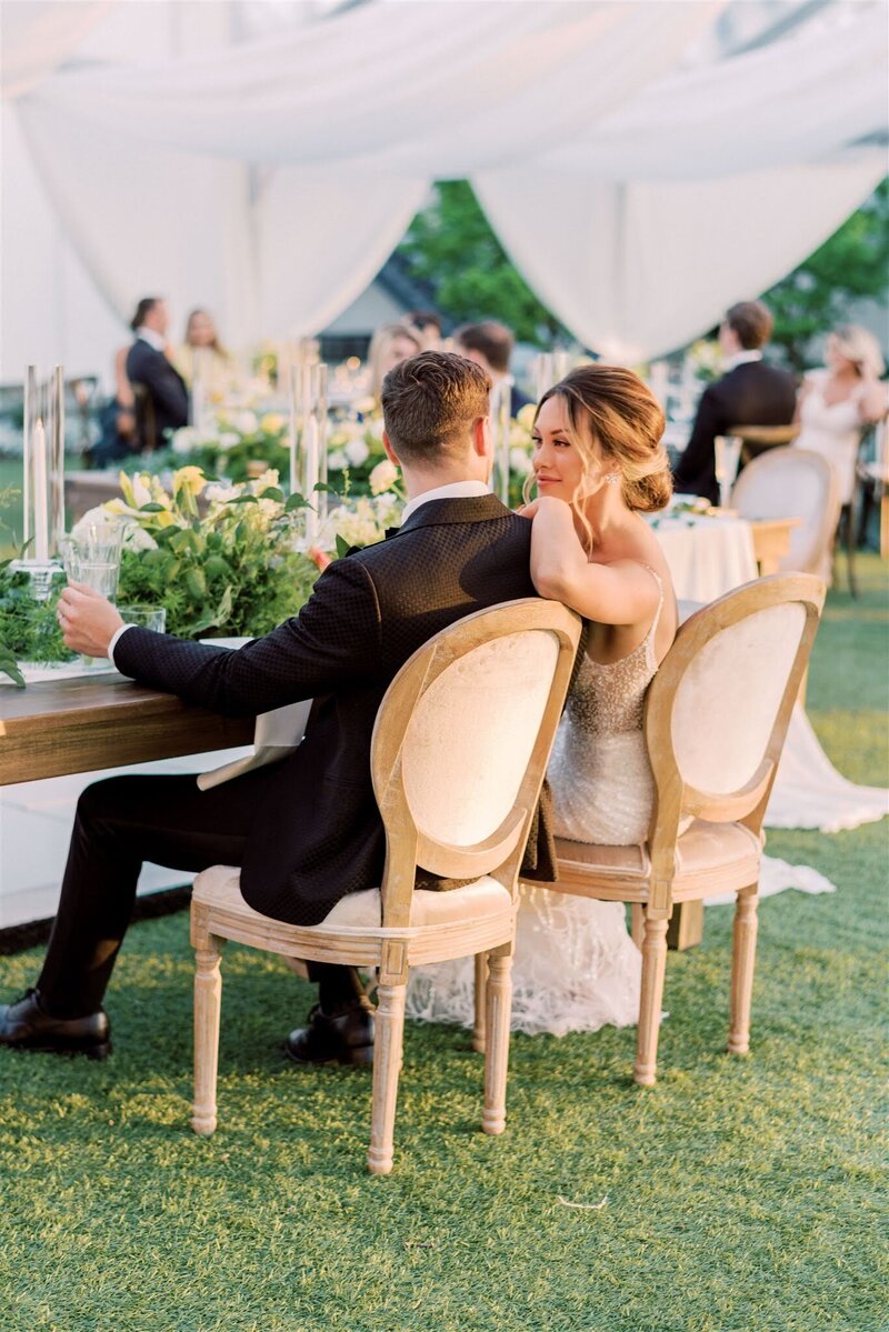 Groom and Bride reception, sweetheart table, yellow flowers, garden wedding, Dallas Arboretum