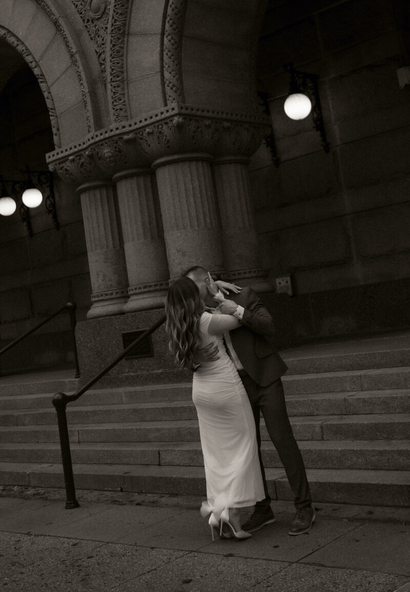 couple eloping in front of Milwaukee Federal Building
