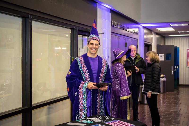 A man dressing up as a wizard at the Wayne YMCA fundraising event.