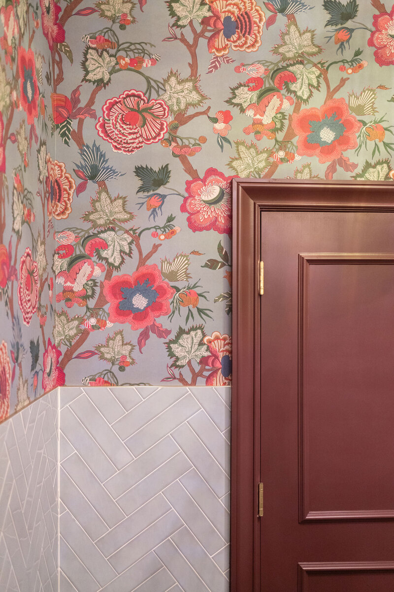 unique and bursting with personality wallpaper in guest restrooms; floral, colorful, pops of femininity