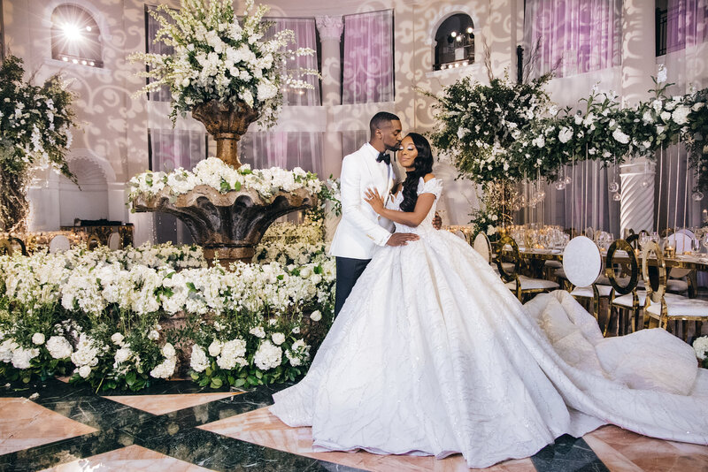 Couple celebrating their elegant wedding reception at a luxurious South Florida venue.
