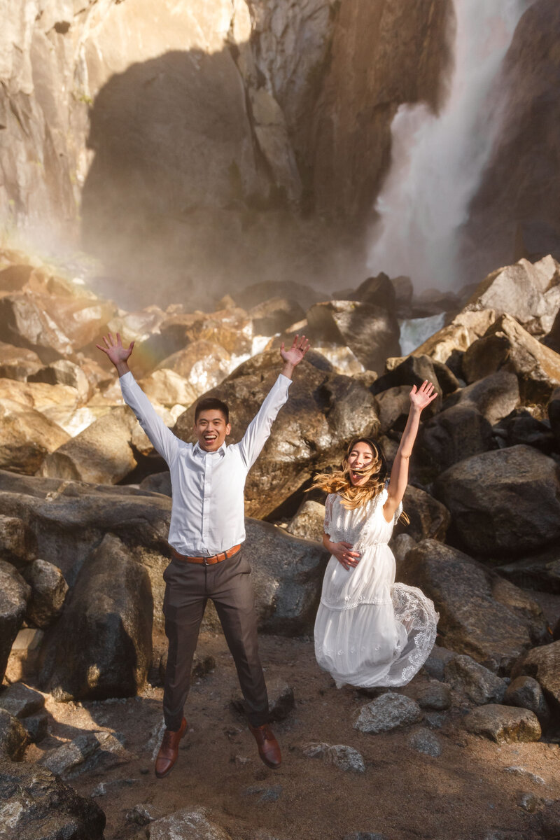 Couple jumps for joy at their Yosemite Falls elopement.