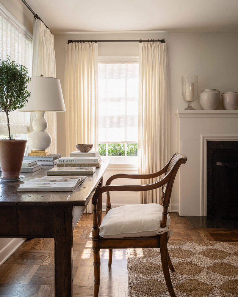 home-office-wooden-desk-white-curtains-light-filled