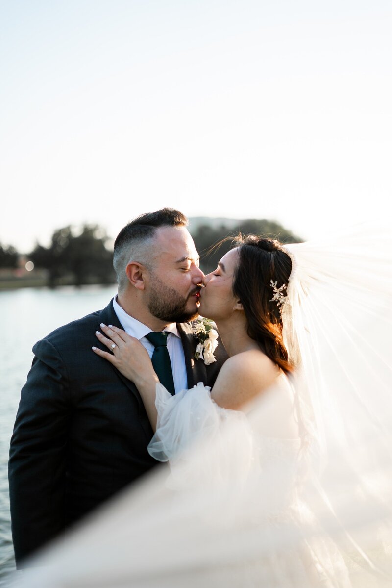 Bride and groom kissing
