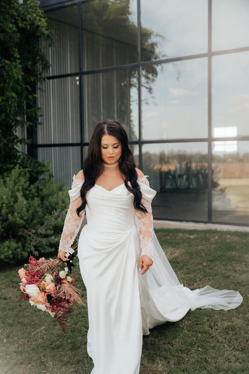 bride walking in her dress