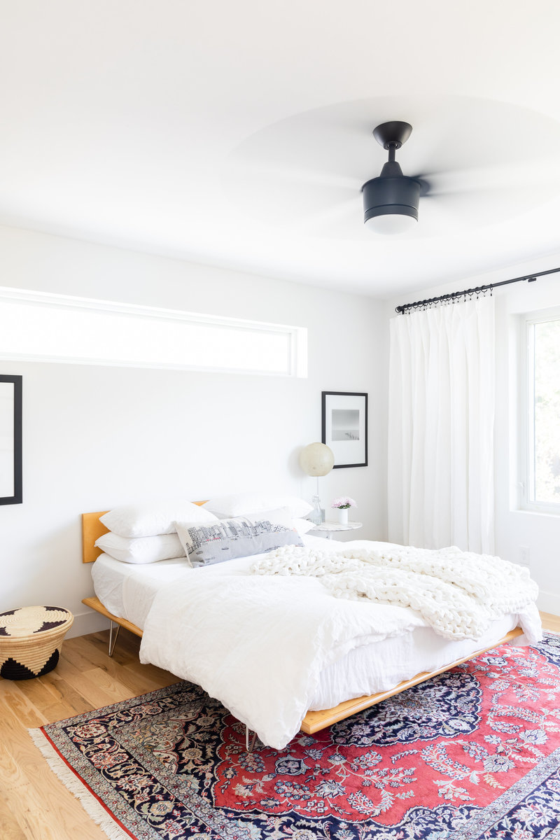 Light filled modern master bedroom design by Denver based interior designer Fernway & Avalon