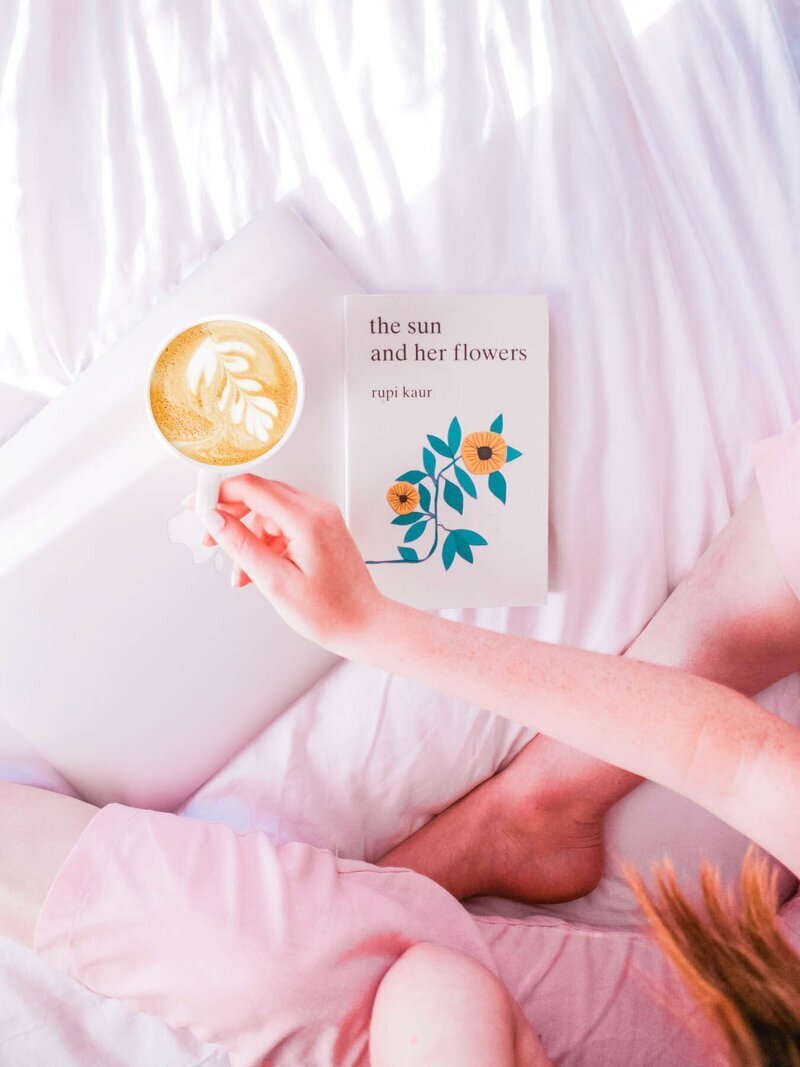 travel concierge for luxury planning with coffee and a book
