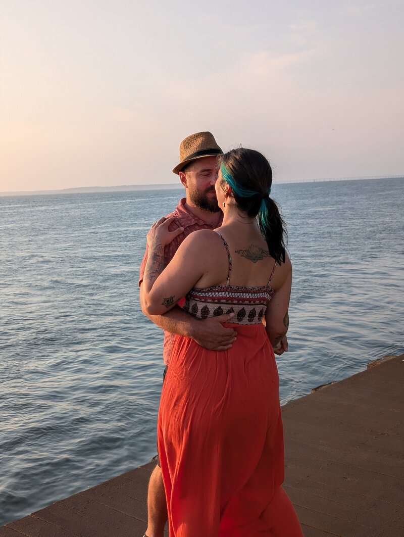 Julie Pokorny lifting her 6 year old above her head as they play outside in Baltimore , Maryland. Represents strength, play, and happiness. 