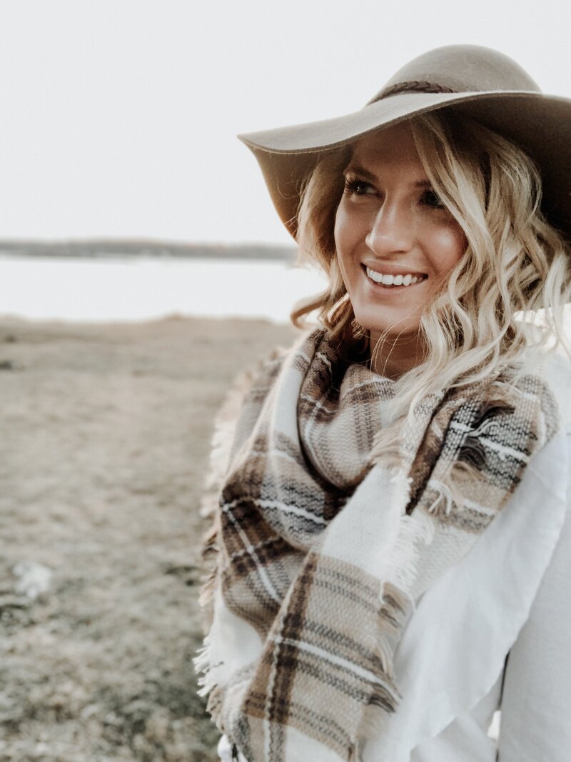 A satisfied influencer and modern network marketer sharing their experience with a custom, engaging website designed by Grassroots Creative Company to elevate their online presence.