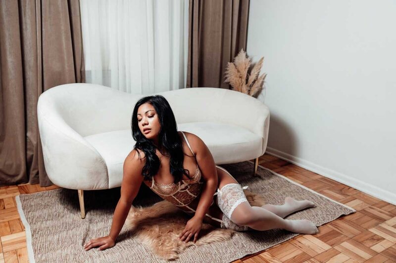 Boudoir portrait of woman in luxury minimalist studio