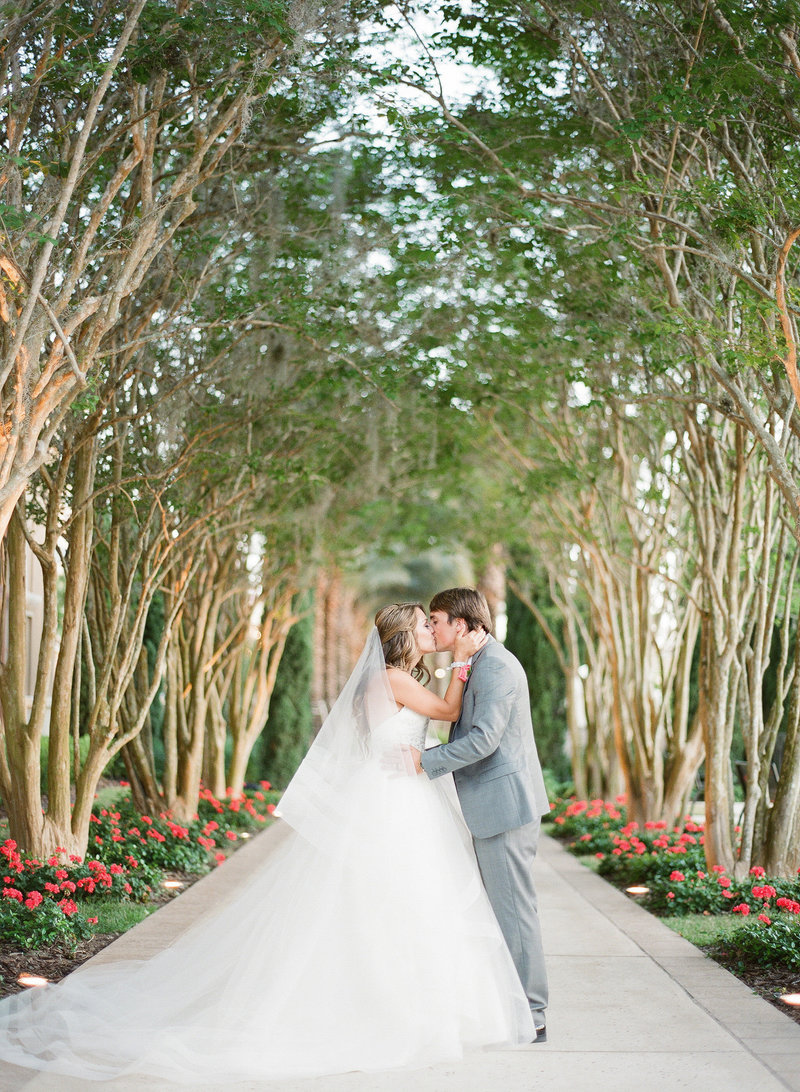 Bride and Groom at Four Seasons Under the trees