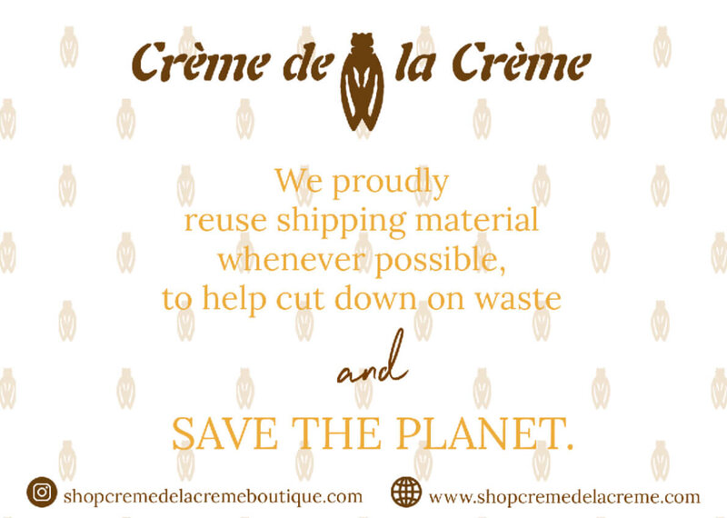 A sign stating Crème de la Crème reuses shipping material to reduce waste and help save the planet, featuring brand design by Sweet Pea Ink Creative, with website and social media info at the bottom.