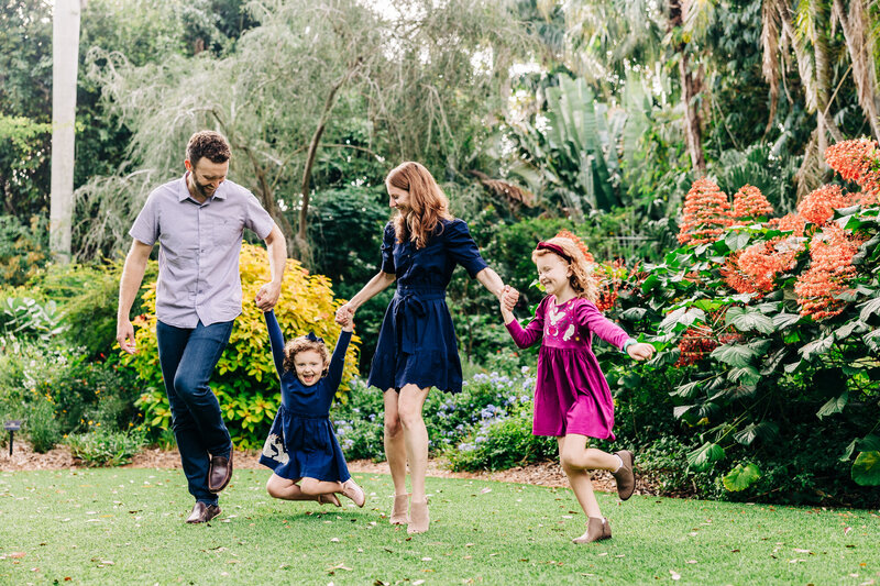 Laughter-filled photoshoot near the scenic waterfront and historic structures in St. Pete.