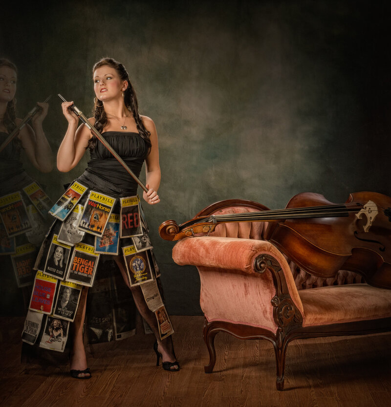 lady posing with bass