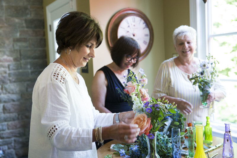 Arranging flowers for nursing homes