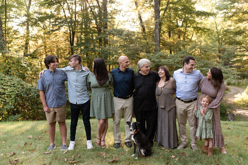 Extended family laughing in field  | Sharon Leger Photography