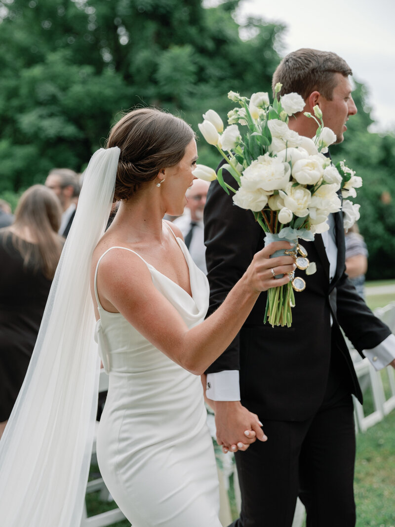 Bride and Groom recess after their Rust Manor House wedding ceremony.