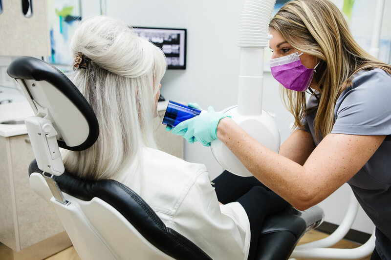 Prosthodontist performing TMJ disorder treatment on a patient at Peak Prosthodontics in Lethbridge—providing expert care to relieve jaw pain, tension, and chronic headaches. Serving Southern Alberta including Medicine Hat, Pincher Creek, and surrounding areas.