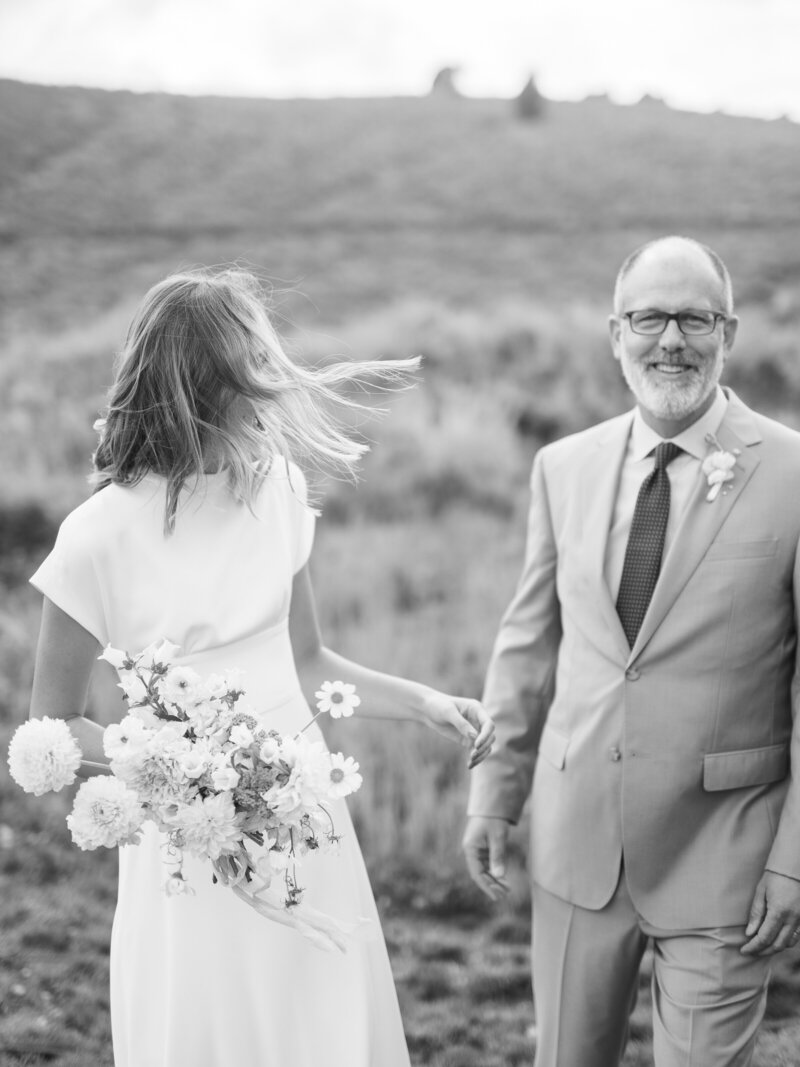 Bride and Father laughing