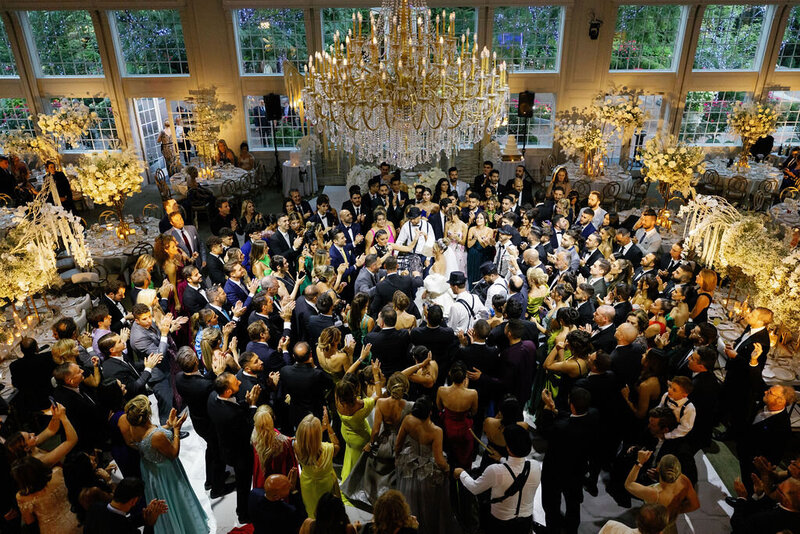 Luxury wedding reception with chandeliers and dance floor — NJ event designer