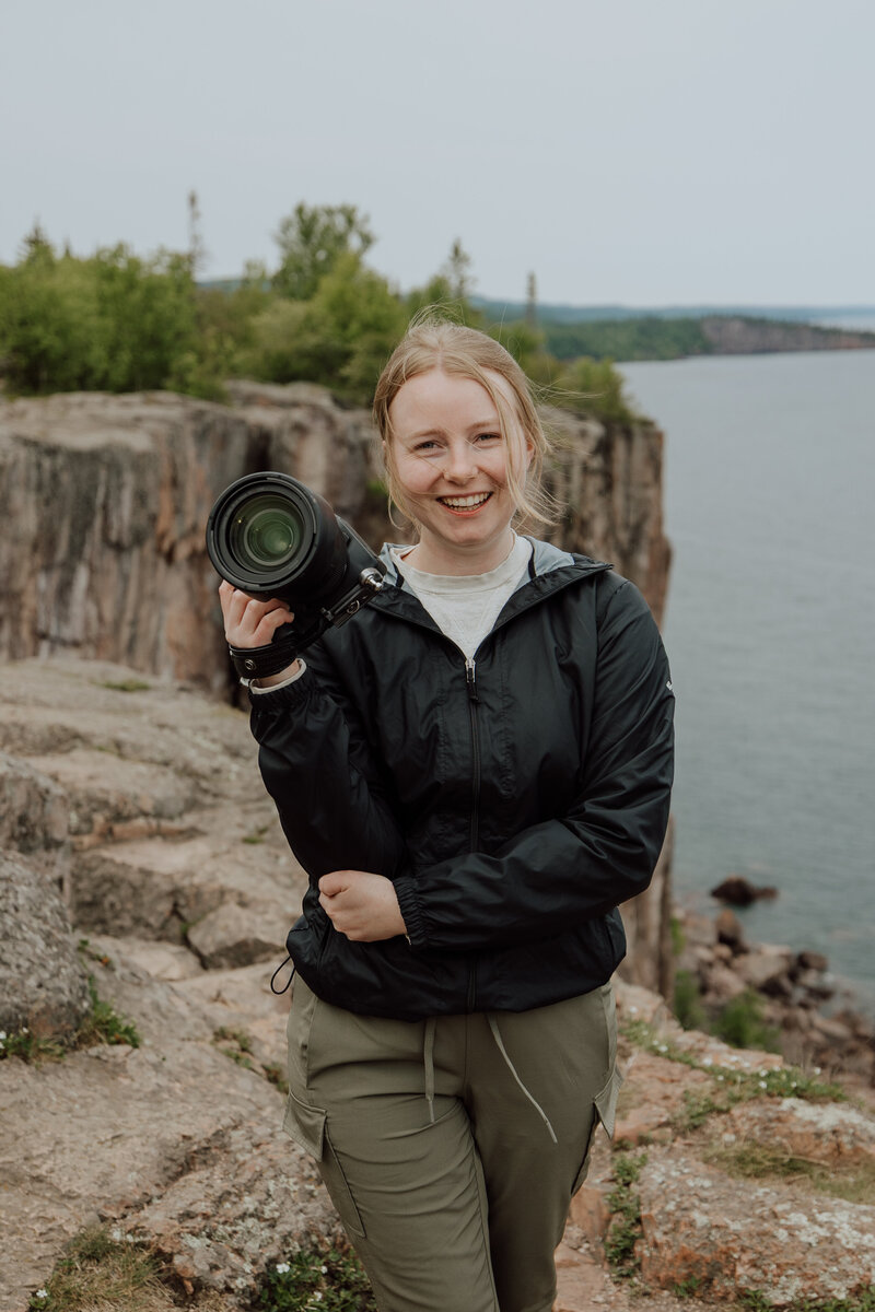Elopement photographer based in Wisconsin smiling at camera